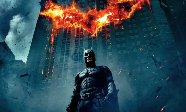 Batman in front of his symbole
